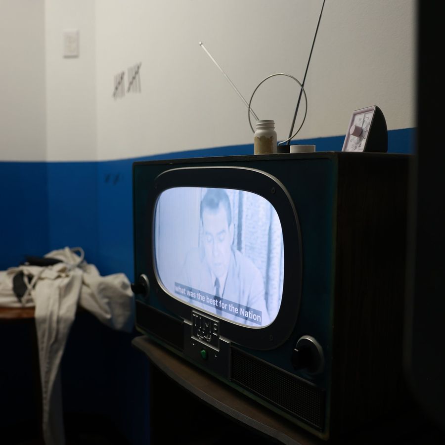 A vintage TV showing a clue in the 1974 Madhouse asylum setting