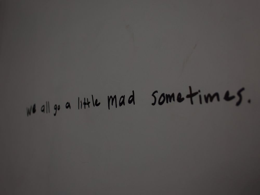 We all go a little mad sometimes, signature detail inside the Madhouse escape room